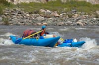 Surfing a raft at the Ledges