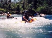 Surfing at Big Rock (House Rapid)