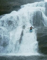 Adam Thomas Running Bald River Falls