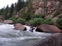 Karen running a slot in Boulder Garden