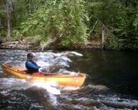 River-wide Surfing Wave