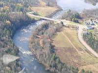 Flyover - Northern Waters Camping in trees on River Right