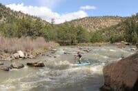 Hattie Paddleboarding Through Aragon