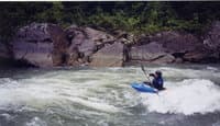 Gordon Byrd surfing at Moon Shoot Rapid