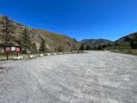 Parking area at river access about 1/2 mile downstream of Burma Road bridge.