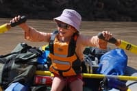 Cassia rowing the raft on Labyrinth Canyon
