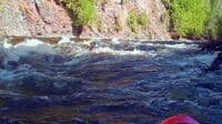 Doug Heym punching a big hole at 720cfs