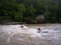 Keith Woodward and Jason Foley surfing it up on the Cumberland River