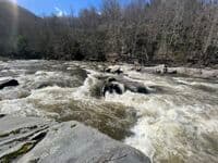 Hole on river right of the biggest rapid other than the dam