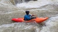 Trey Moore paddling the new rapids