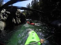 Paddling under large wood