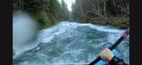 A fun stretch of big water against a mossy bedrock wall near the end of the run