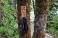Signage to Encouraging Visitors to Pack Out Trash