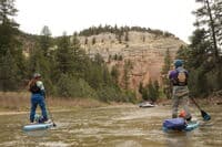 Kestrel and Hattie Paddleboarding the Rio Chama