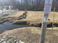 Confluence of two tiny streams
