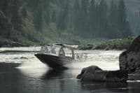 Jet Boat Passing Johnson Creek Camp