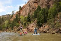 Kestrel and Hattie Paddleboarding the Rio Chama