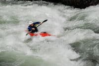 Surfing at Revenue Bridge Rapid