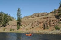Raft Group Passing by Camp
