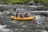 Aki Rafting Through Trestle