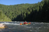 Paul Floating in Towards Deadman Creek