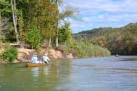 River widens, but is still shallow.