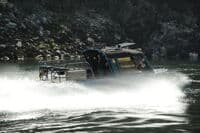 Jet Boat Passing Johnson Creek Camp