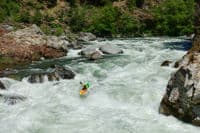 Kayaker dropping in at Freight Train