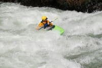Surfing at Revenue Bridge Rapid