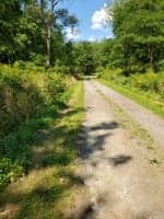 Road to putin at bottom of hill, catch the trails to right to enter upstream so to do the "loop" spoken of.