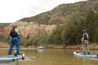 Kestrel and Hattie Paddleboarding the Rio Chama