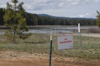 No Trespassing Sign and Bridge Right-of-Way Marker