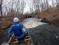 Paddling the ledge at Mckusker